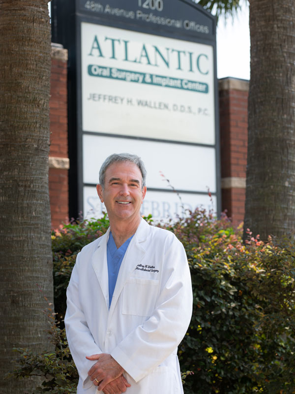 Dr. Wallen standing outside office